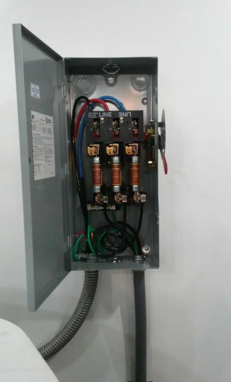 Three-phase disconnect switch installed for Smoke Detector Installation in Newport